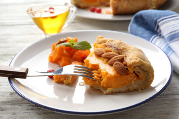 Homemade pumpkin pie on table
