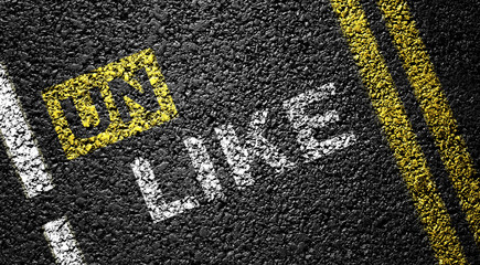 Obraz premium like not unlike on the the asphalt road