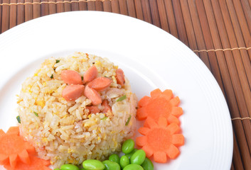 Rice with vegetables and sausages