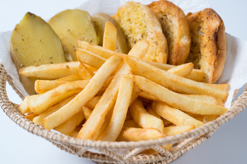 French fries in a Basket on white background