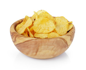 potato chips with paprika in olive bowl