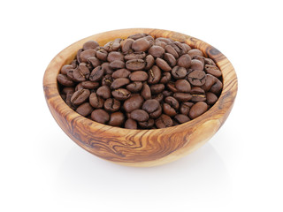 roasted coffee beans in olive wood bowl
