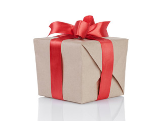 cube gift box wrapped with kraft paper and red bow