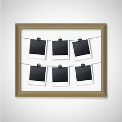 wooden frame with photos inside