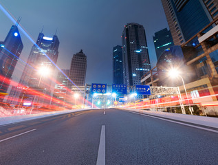Fototapeta premium Asphalt road and modern city