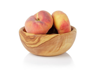 ripe flat donut peaches