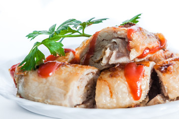 Meatloaf with ketchup and parsley