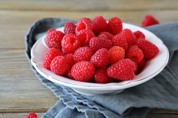 full bowl of fragrant raspberries