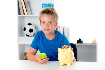 boy with piggy-bank and phone