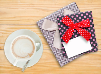 Gift box and paper note with coffee cup