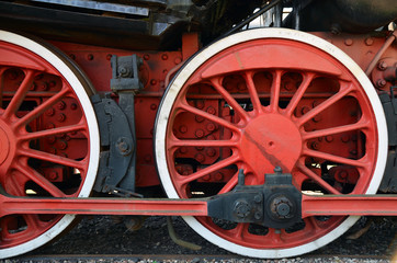 Fototapeta na wymiar Detail of the wheels of an old steam train