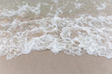 beach wave and sand