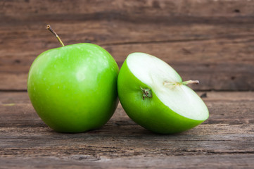 green apple on a wooden background