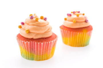 Colorful cupcakes isolated on white