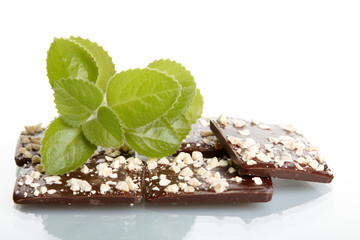 Mix chocolate and mint close up on white