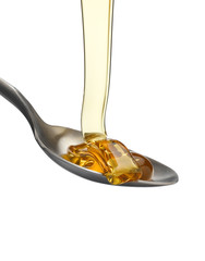 Golden Treacle flowing onto spoon