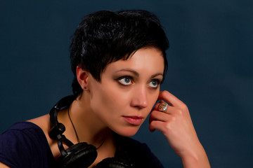 girl with short hair with headphones