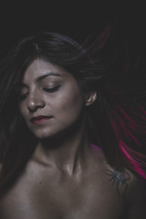 Beautiful latina woman with hair flying