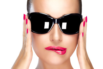 Beautiful Model in Black Fashion Sunglasses. Bright Makeup and M