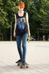 Beauty Girl Skating in gardens