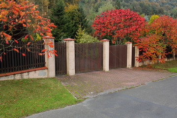 wooden gate in autumn scenery