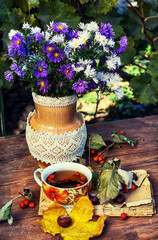 bouquet of wild flowers in a pot in the garden