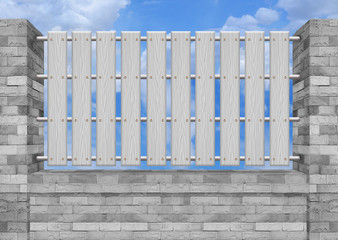 White picket fence, brick wall.