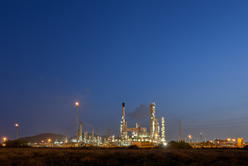 Fototapeta na wymiar Oil refinery at twilight - factory