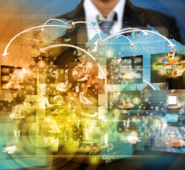 businessman holding Reaching images streaming in hands .Financia