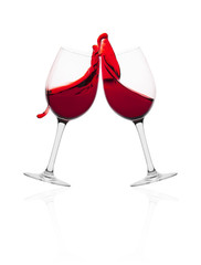 Wine glasses in with splash of wine