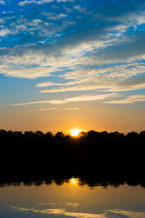 sunset on the river.  dramatic sunset over a lake