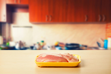 Chicken fillet on a kitchen table