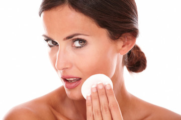 Pretty mature woman smooth up her face