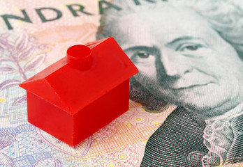 Litet rött hus på svensk sedel