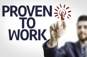 Business man pointing the text: Proven to Work