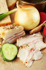 Bacon, fresh vegetables, boiled egg and bread