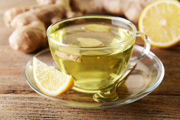 Ginger tea with lemon on table close-up