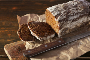 Sliced rye bread and knife