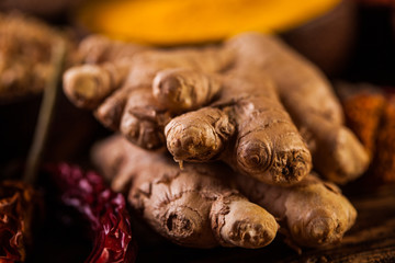 Plenty of traditional Asian spices in wooden bowls