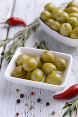 Marinated olives on table close-up