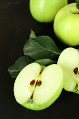 Ripe green apples on wooden background