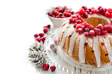 Homemade glazed cranberry cake with fresh berries  copy space