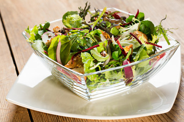 Glass bowl of salad
