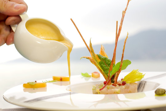 serving dish with lampuga tartare with celery and peach cream se