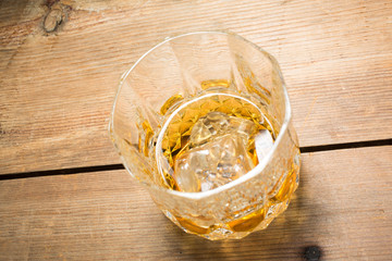 Alcoholic drink in glass with ice