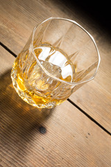 Alcoholic drink in glass with ice