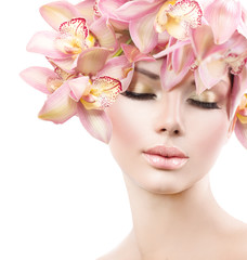 Fashion Beauty Model Girl with Orchid Flowers Hair