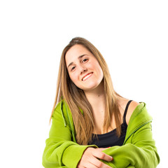 Blonde girl with rollerblade over white background