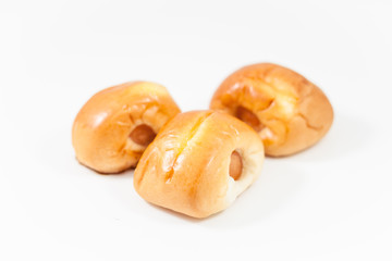 Sausage in the dough isolated on white background