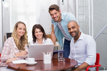 Business team working together with laptop